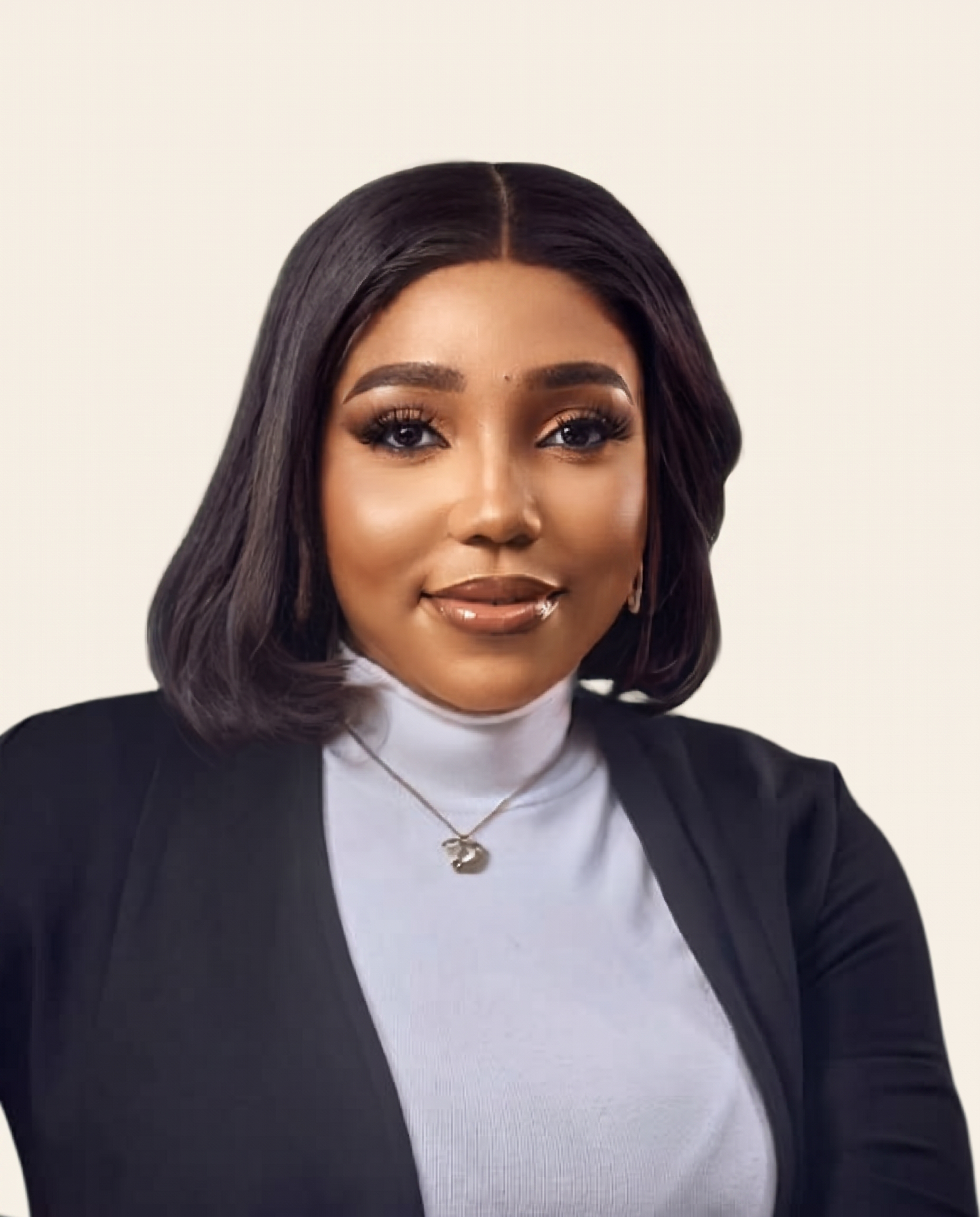 Vivian Aneke, Business Process and Automation Consultant at Caveat by Kave, wearing a black blazer and white turtleneck